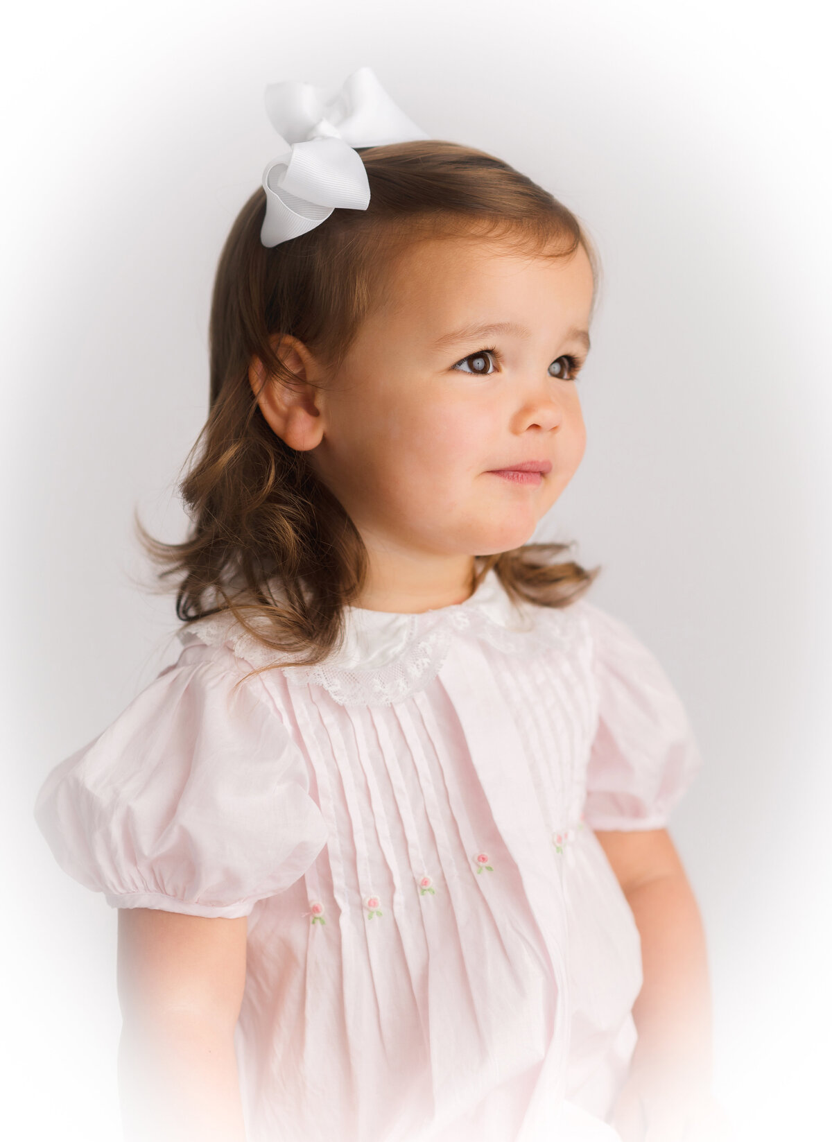 Little girl poses for Heirloom Portraits in Charleston, South Carolina.