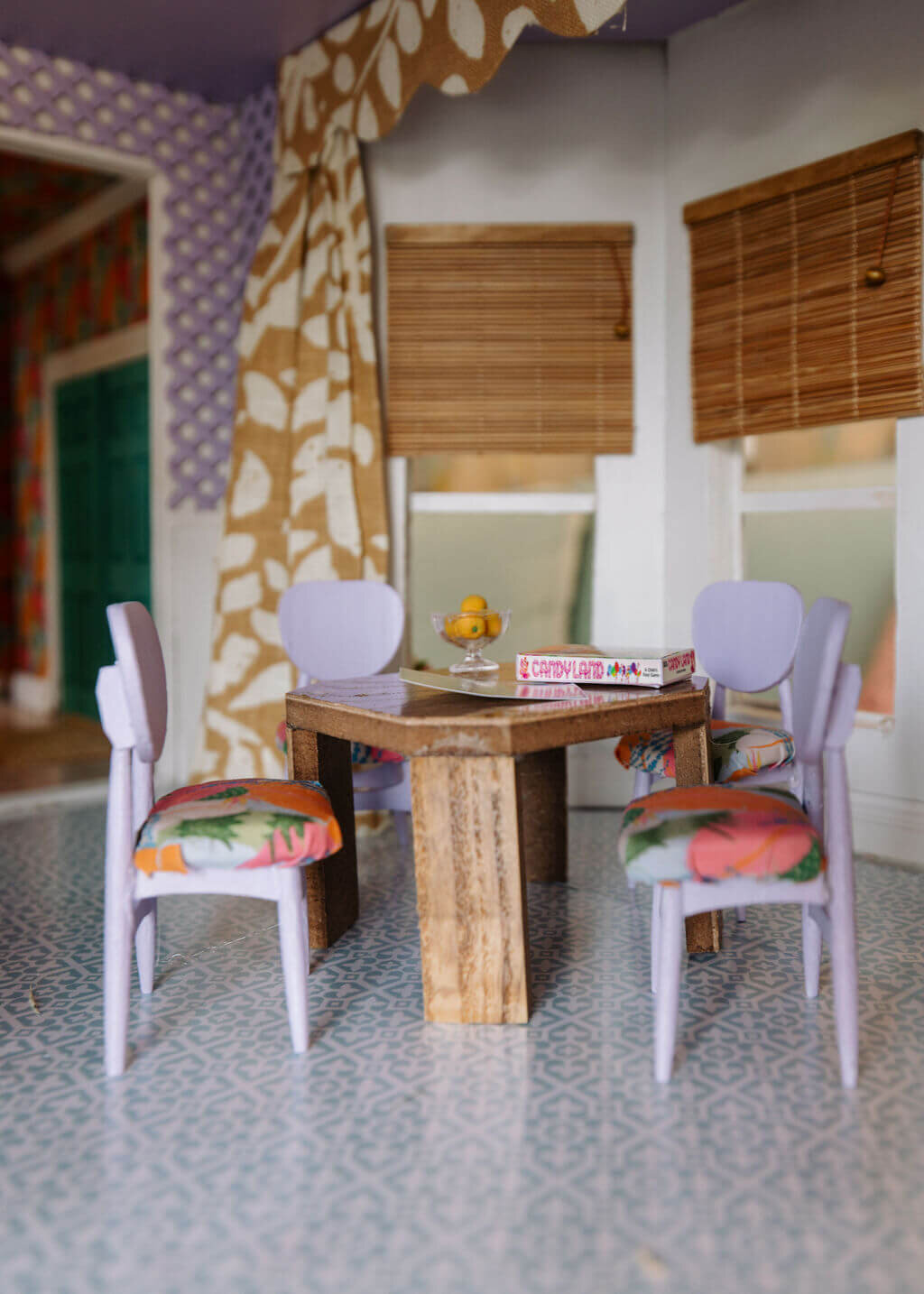 oyster creek studios petite palm beach dollhouse white chairs with tropical cushions around a wooden table