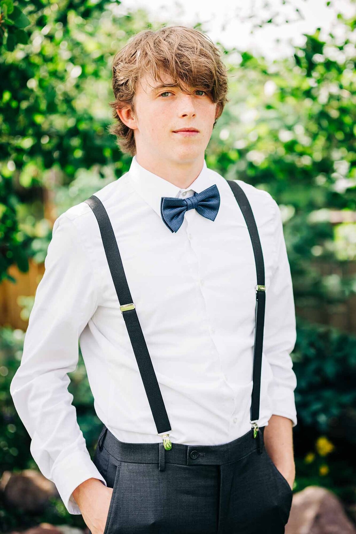 Portrait of boy dressed in formal attire for high school dance