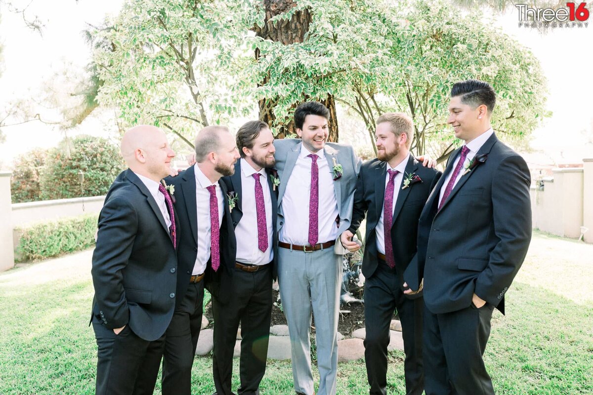 Groom pals around with his Groomsmen