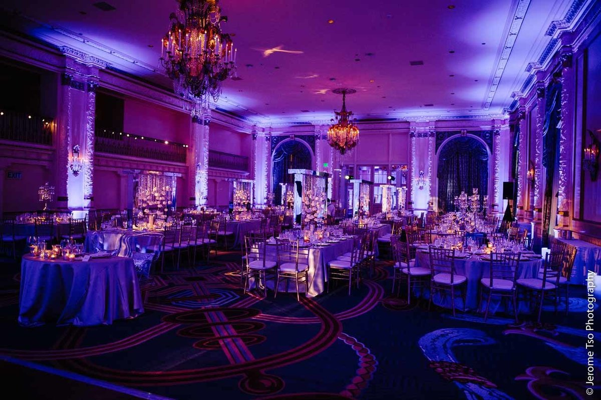luxury wedding at Fairmont Olympic Hotel Seattle with lots of candle light and blue lighting