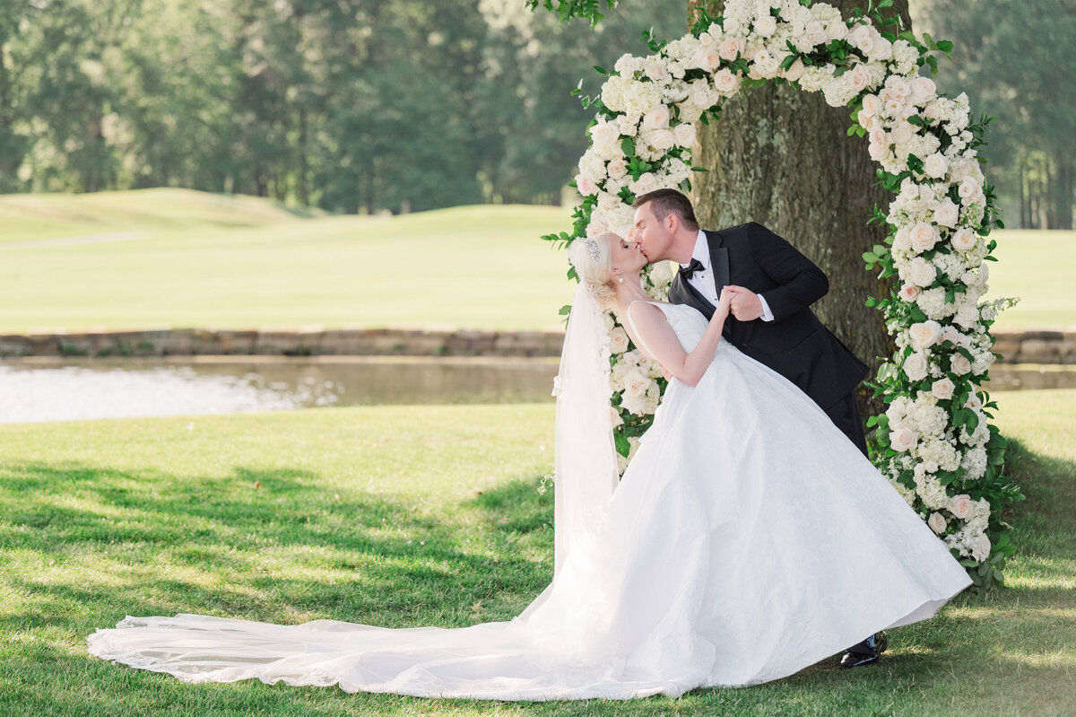 classic traditional wedding photo on the golf course at The Grand Resort