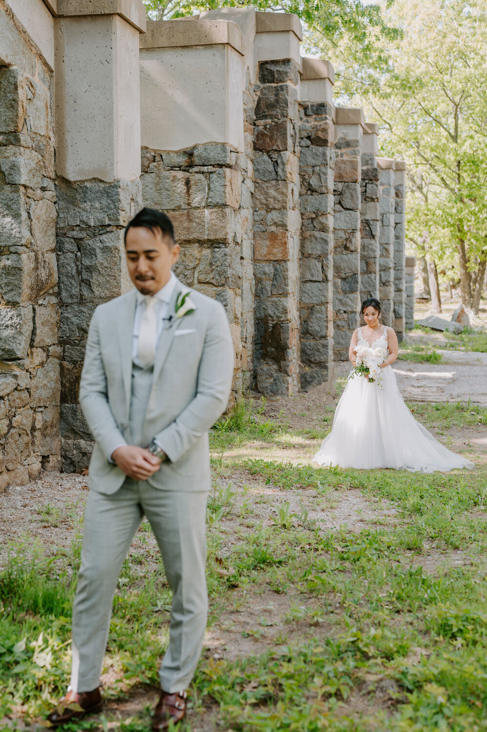Bride and groom preparing for the first look
