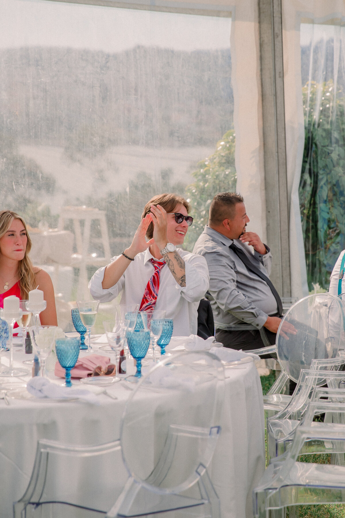 Destination Wedding in Spain | guests clap as bride and groom enter reception