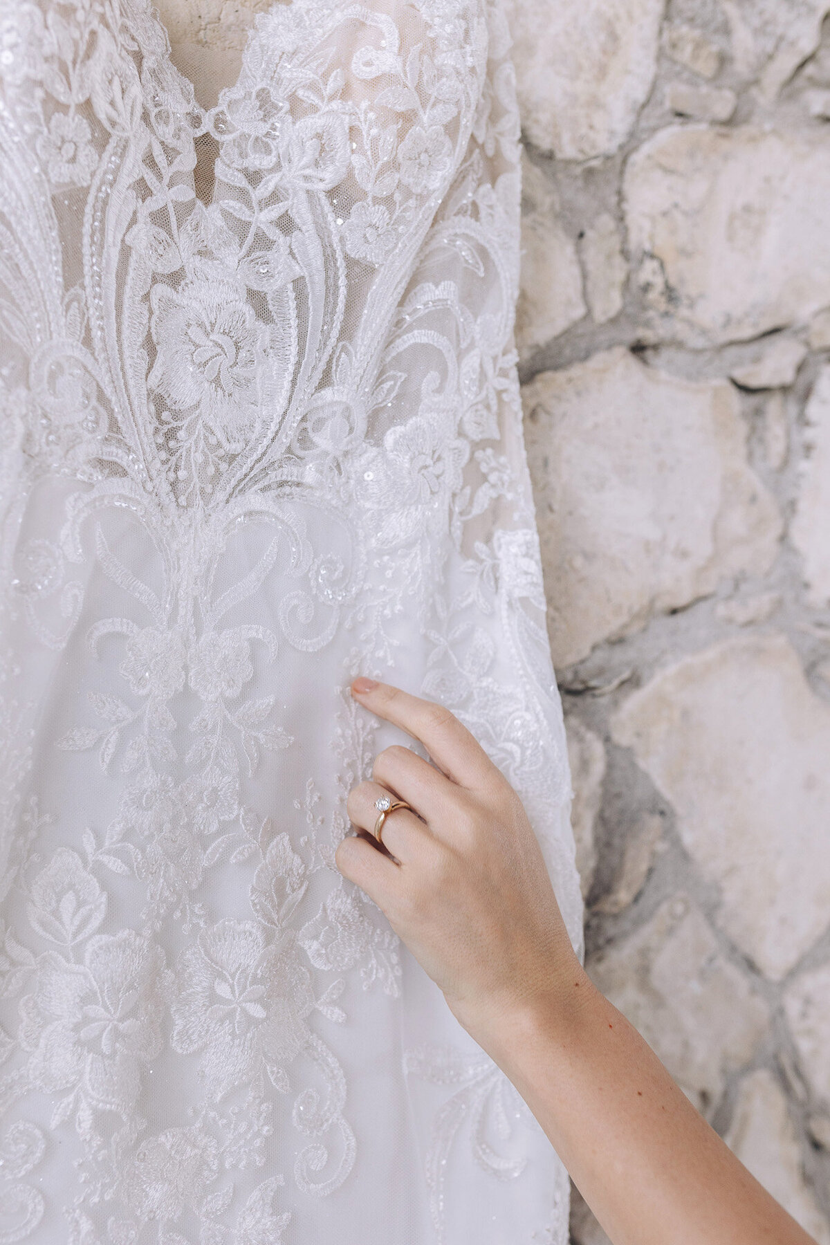 Bride in layered tulle all-white gown with pearl accents for White Whisper luxury wedding in Tuscany