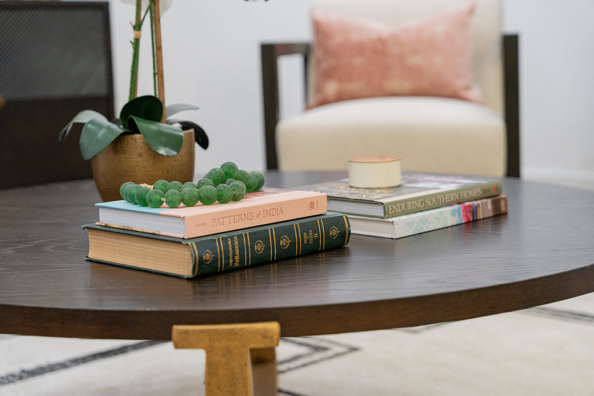 close up image of coffee table with books and decor