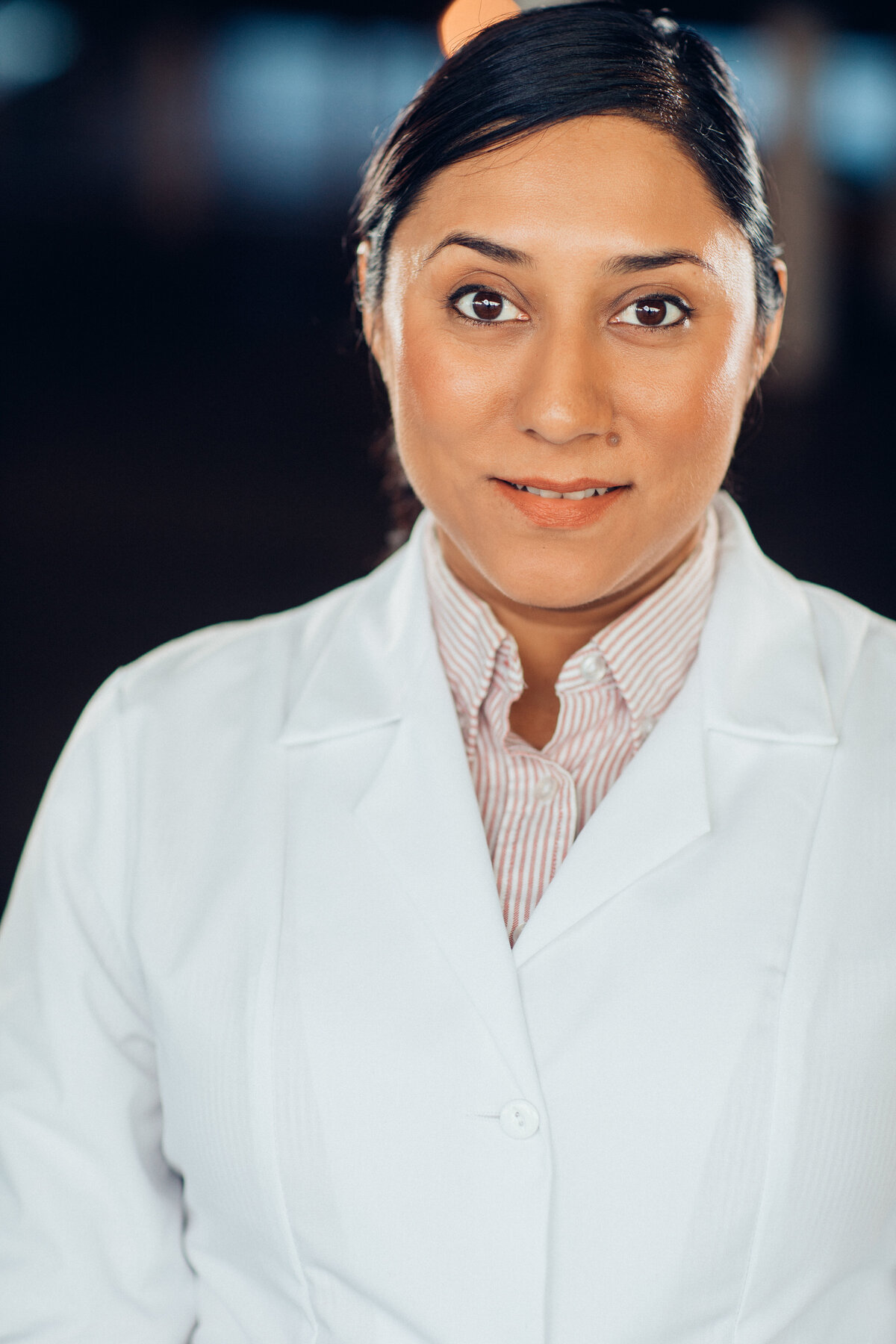 Headshot Photograph Of Young Woman In White Jacket Los Angeles