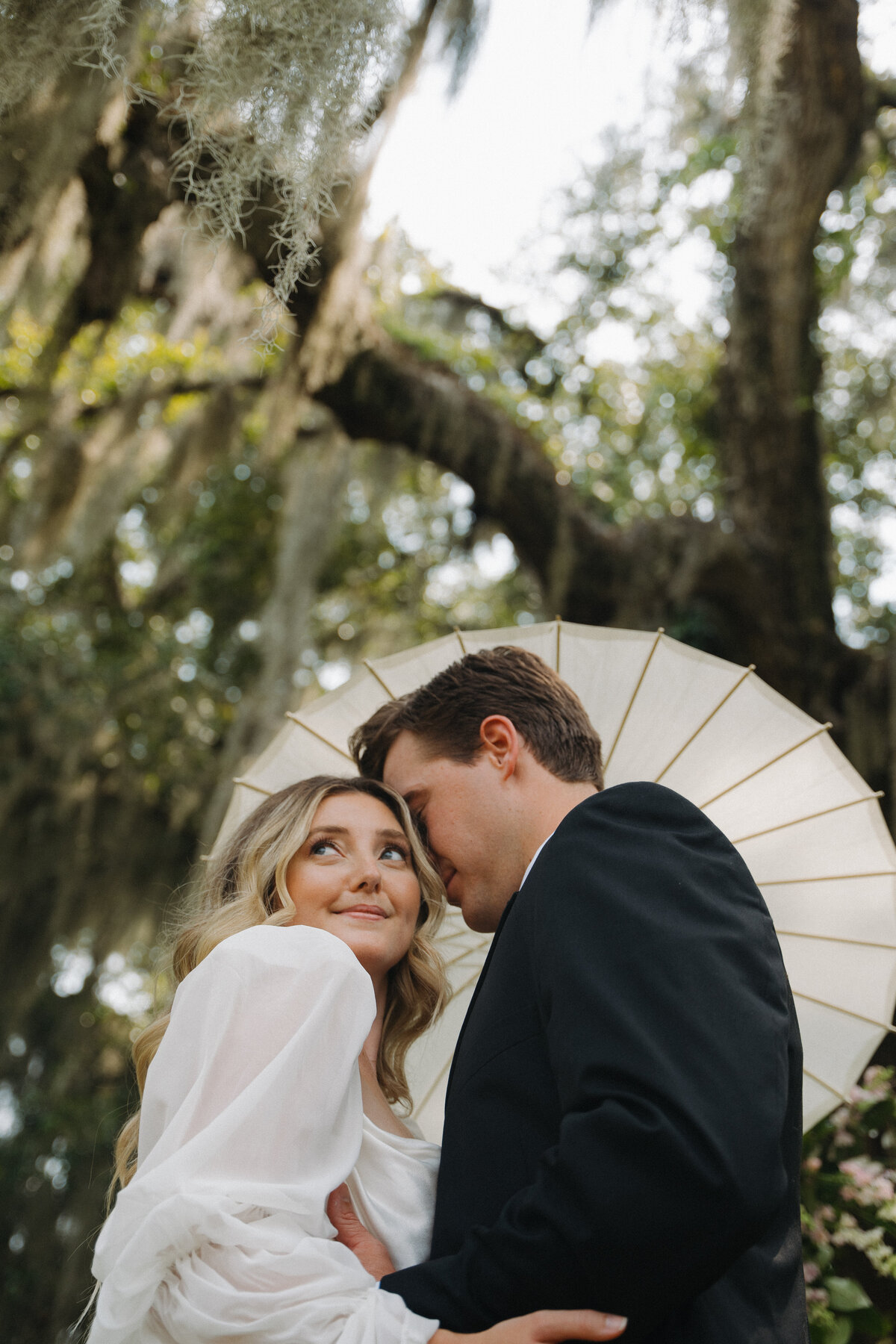 Rustic Charm: Engagement Session with Horses and a Flowing Dress in the Southern Countryside
