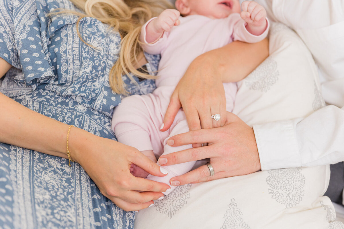 Detilas hands and feet newborn and aprents during life style newborn photo session Laure Photography Atlanta family and newborn photographer