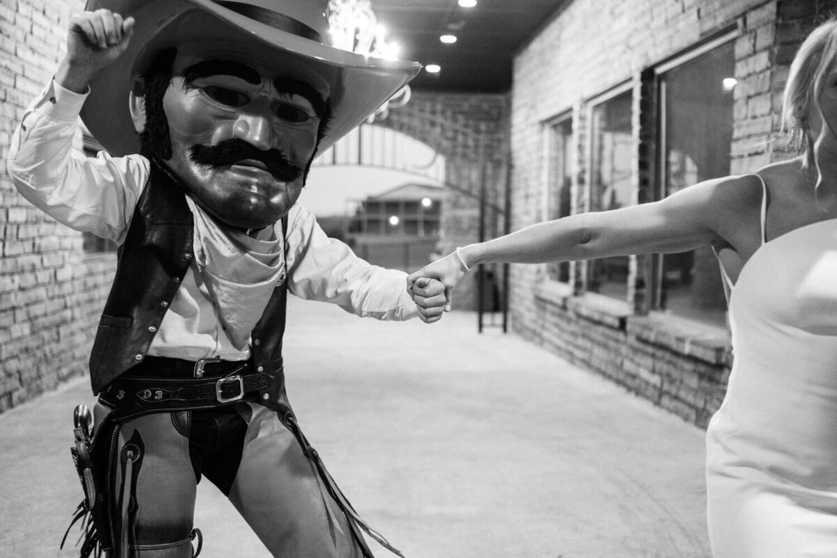 bride-dragging-pistol-pete-away
