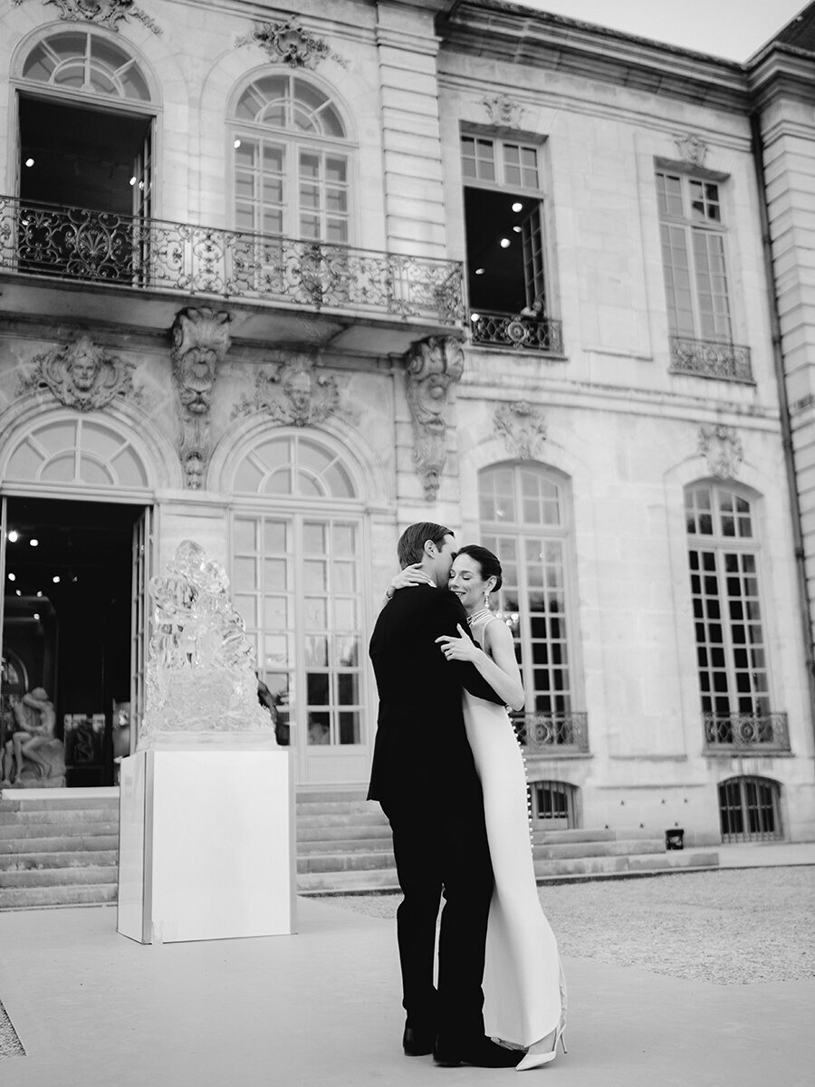 Musee Rodin Wedding by Alejandra Poupel Events B&W bride and groom outside dancing