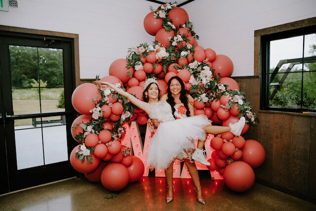 Vibrant red balloon installation for a corporate or celebratory event.