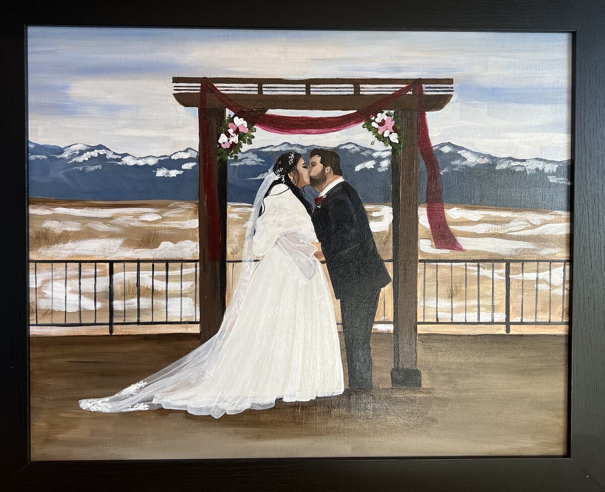 A couple is painted at their wedding during their first kiss