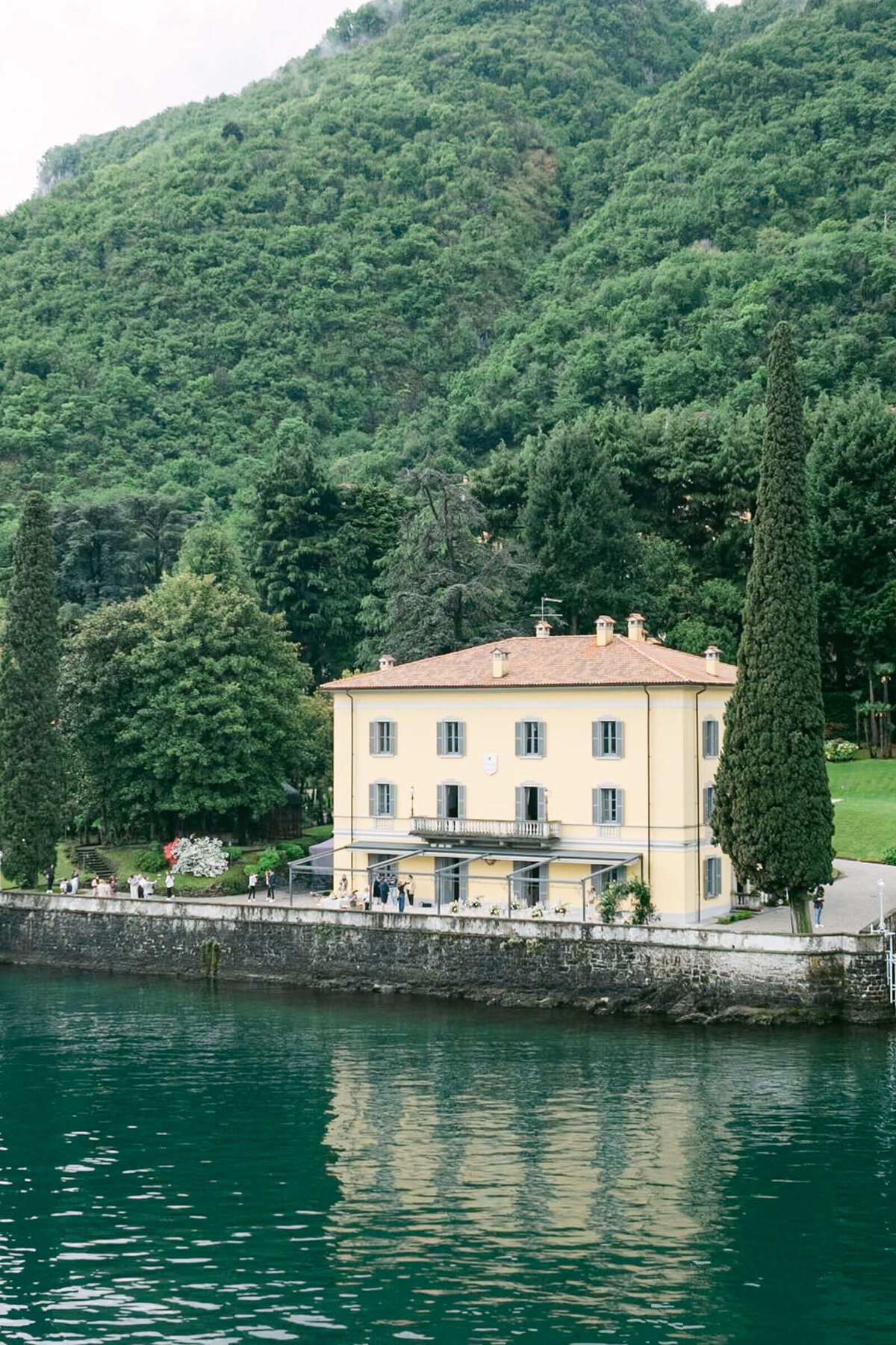 A wedding day drone photo of villa aura del lago on lake como in Italy