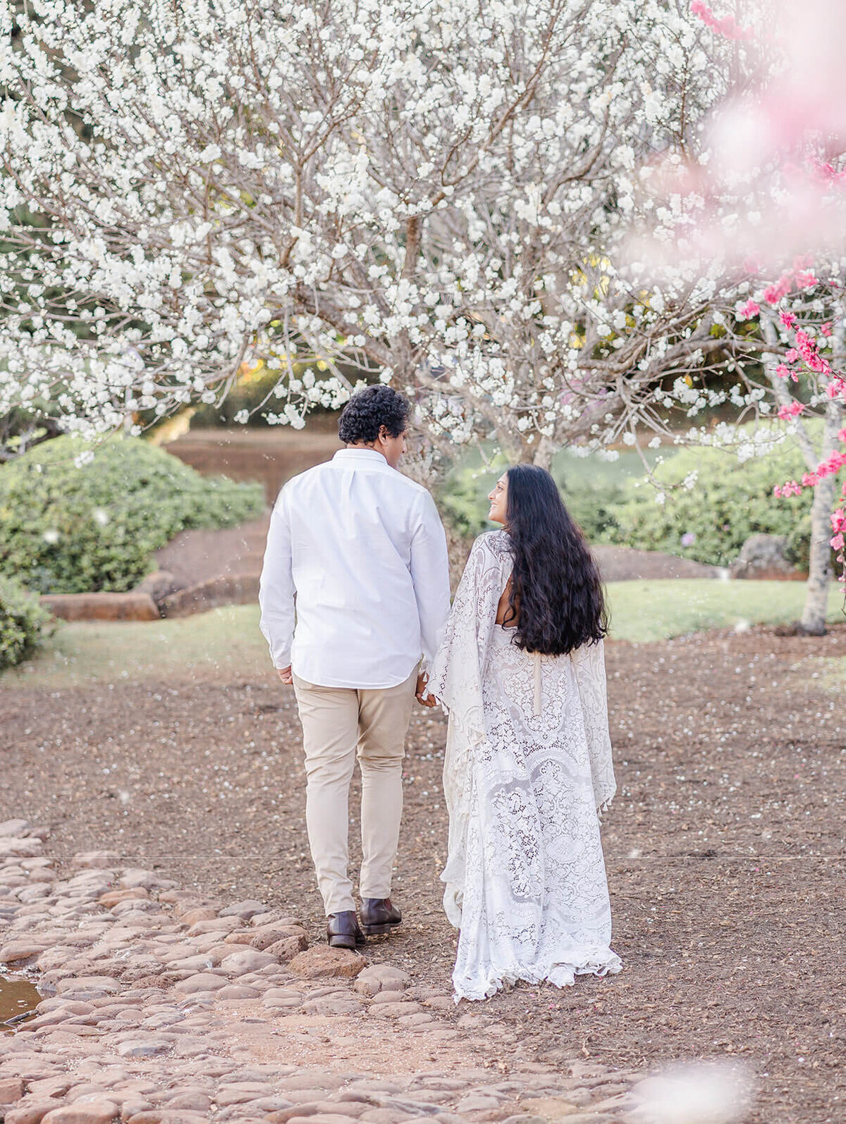Experience the serenity of pregnancy captured at Gold Coast Japanese garden in maternity photos