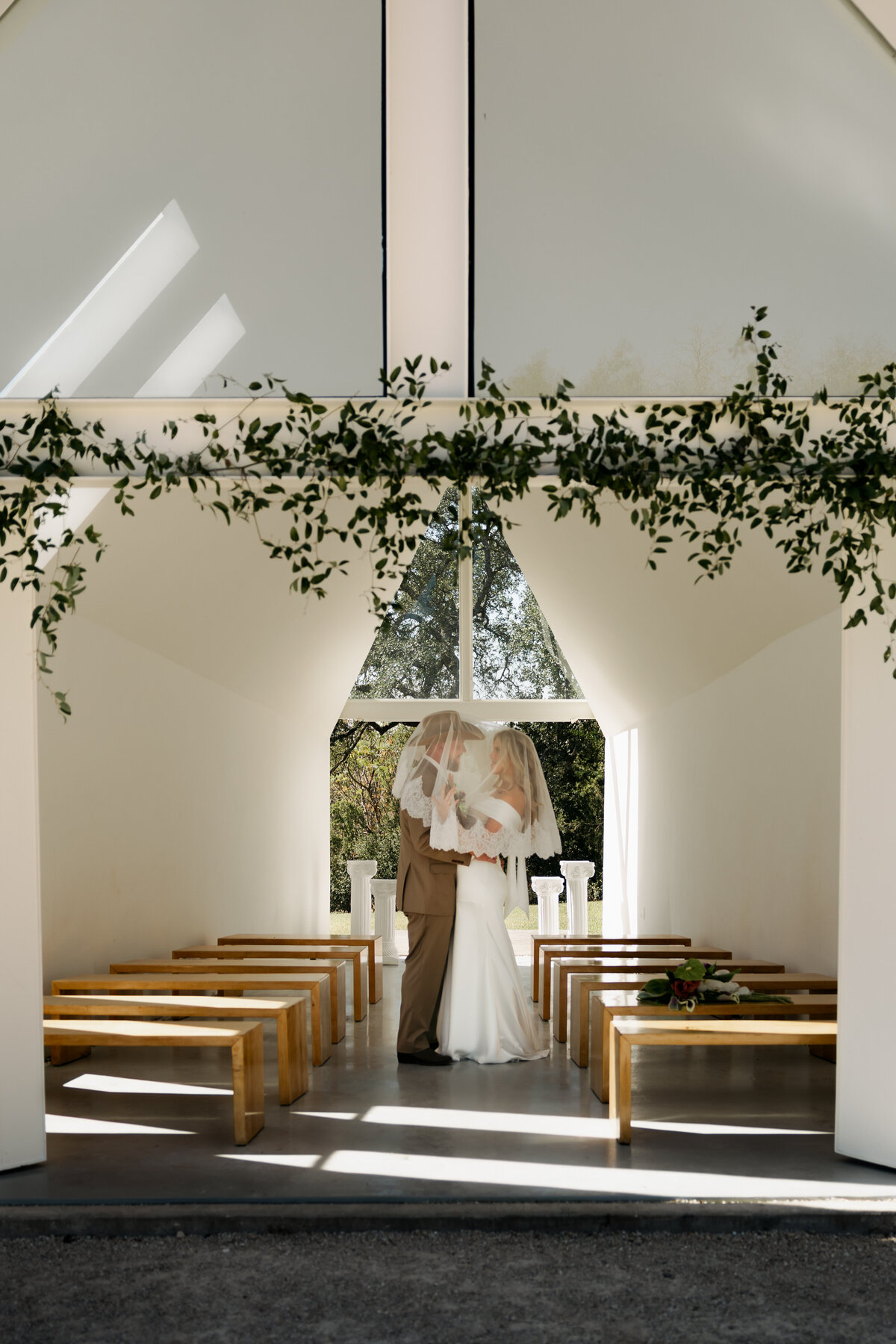 Wedding photographer in Austin with bride and groom at lincoln chapel.