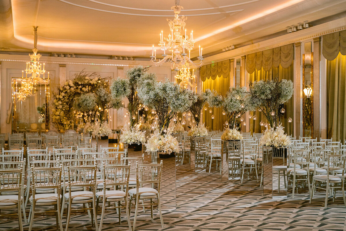 The Claridges ballroom set out for a wedding reception with flowers from the McQueens