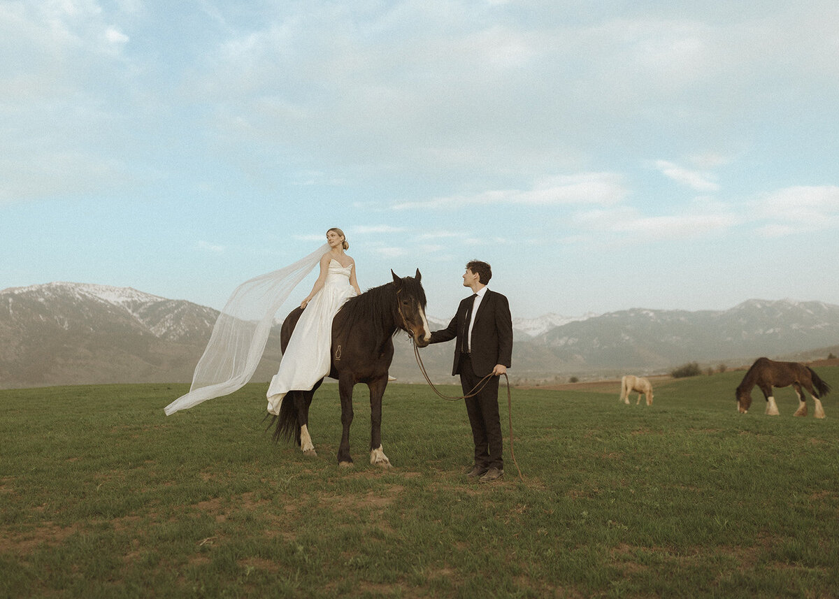 couple-facing-vista-in-elopement