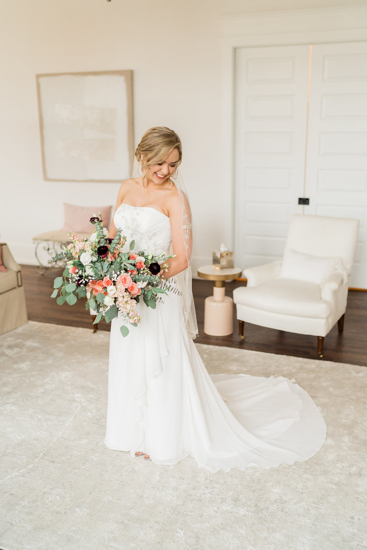 Bride holding colorful bouquet in Alabama