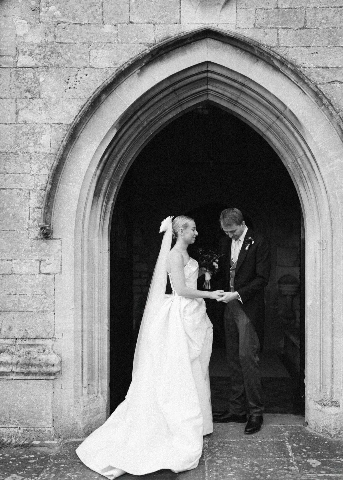 chloe-lowe-wedding-euridge-manor-cotswolds-church-rings-black-white