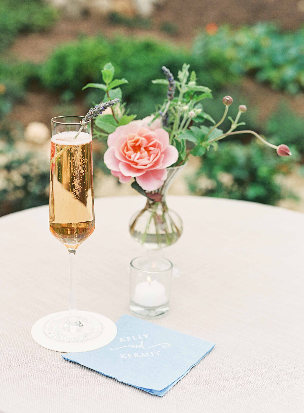 11santa-barbara-estate-wedding-planner-light-blue-white-custom-cocktail-napkins-champagne-cocktail-centerpieces
