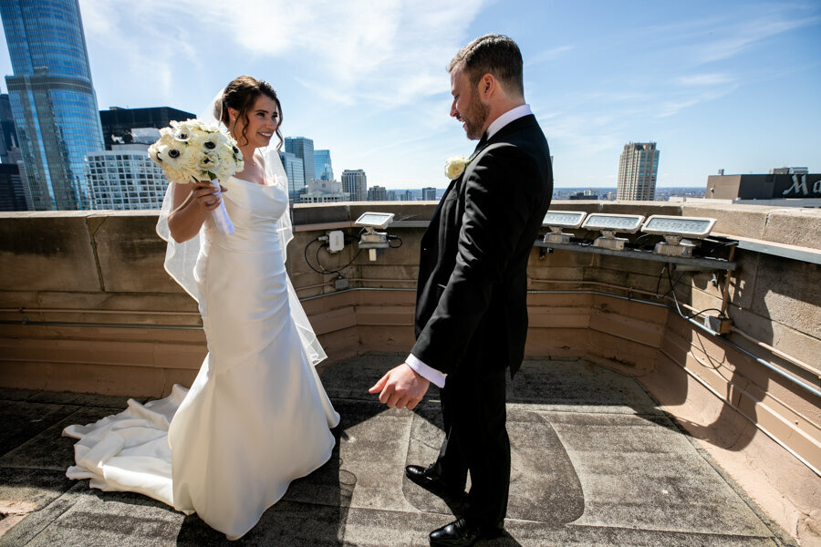 groom-first-look-intercon-rooftop-chicago