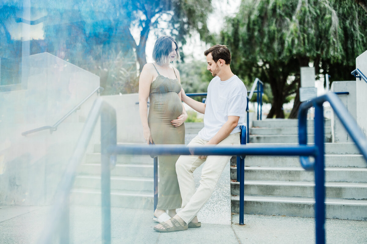 man-looking-at-pregnant-wife