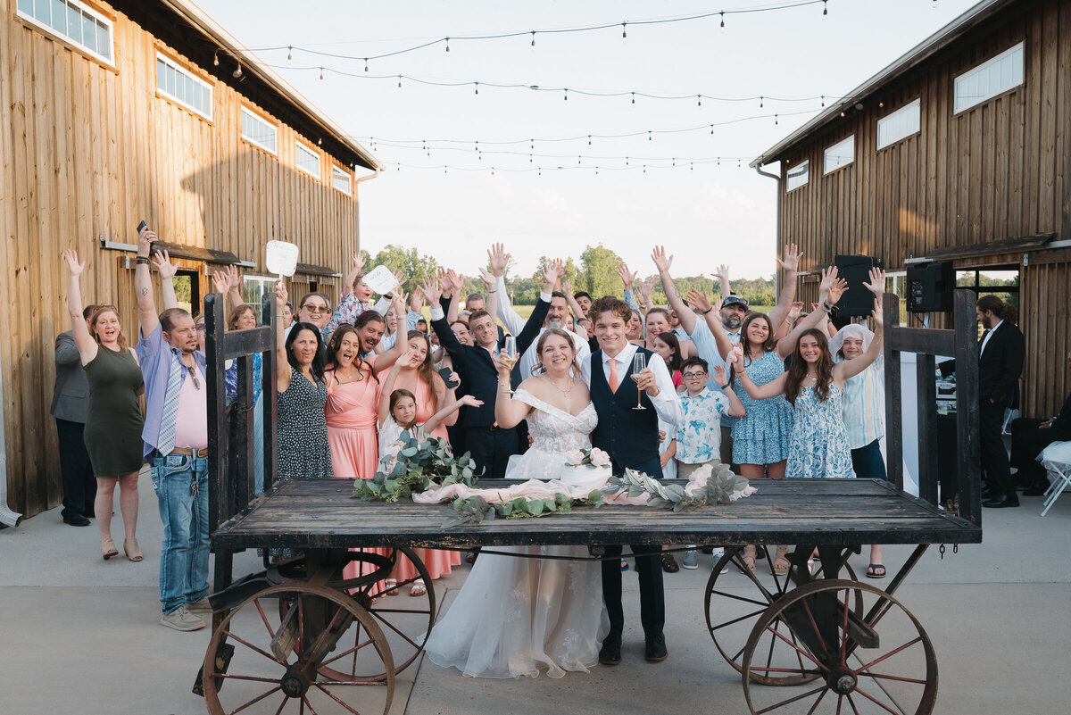 Bride and Groom with family 