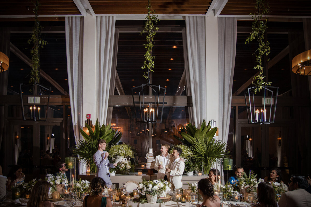 A groom receives a toast  at a destination wedding in Puerto Rico