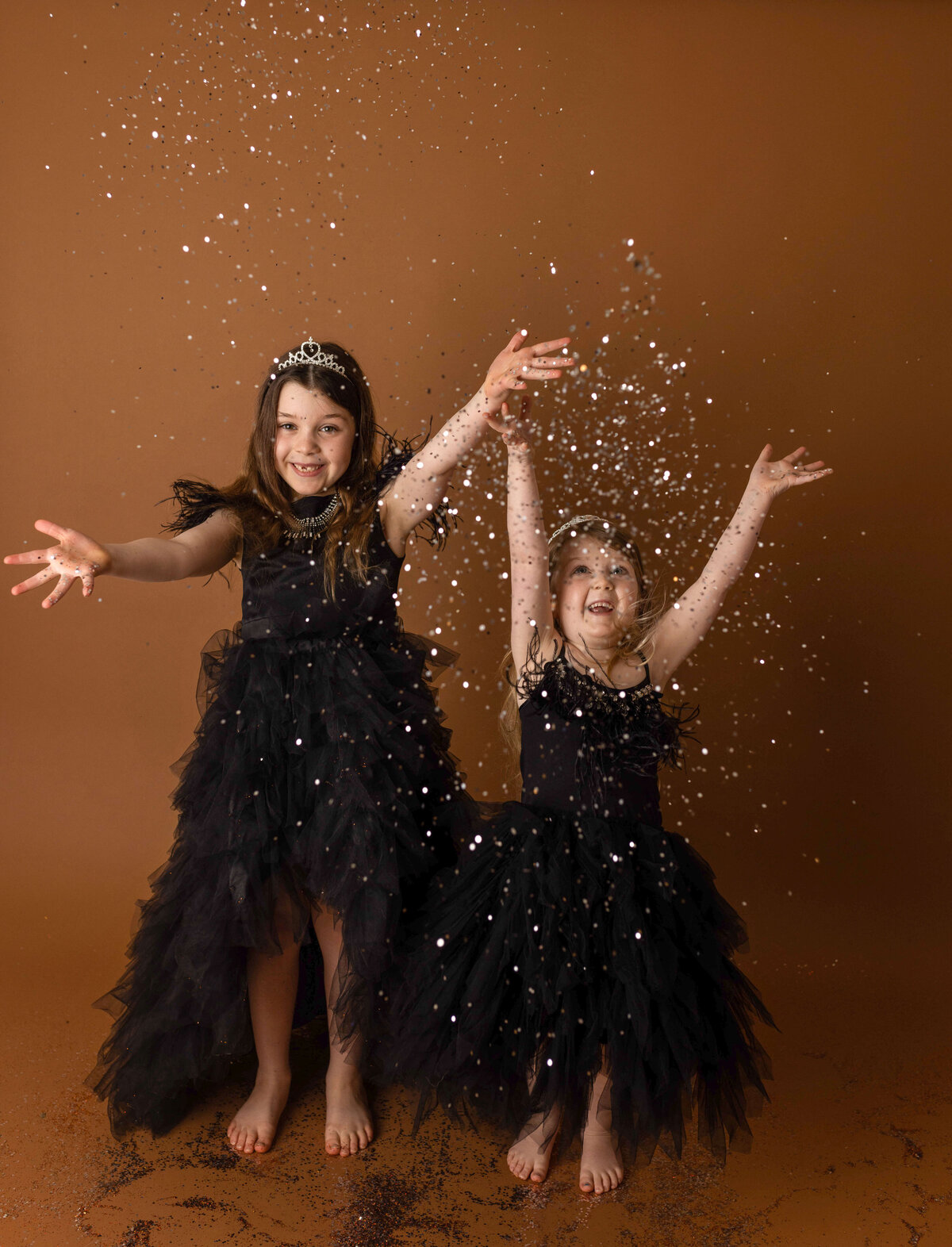 Sisters throwing glitter Woodinville in gorgeous tutu du monde dresses