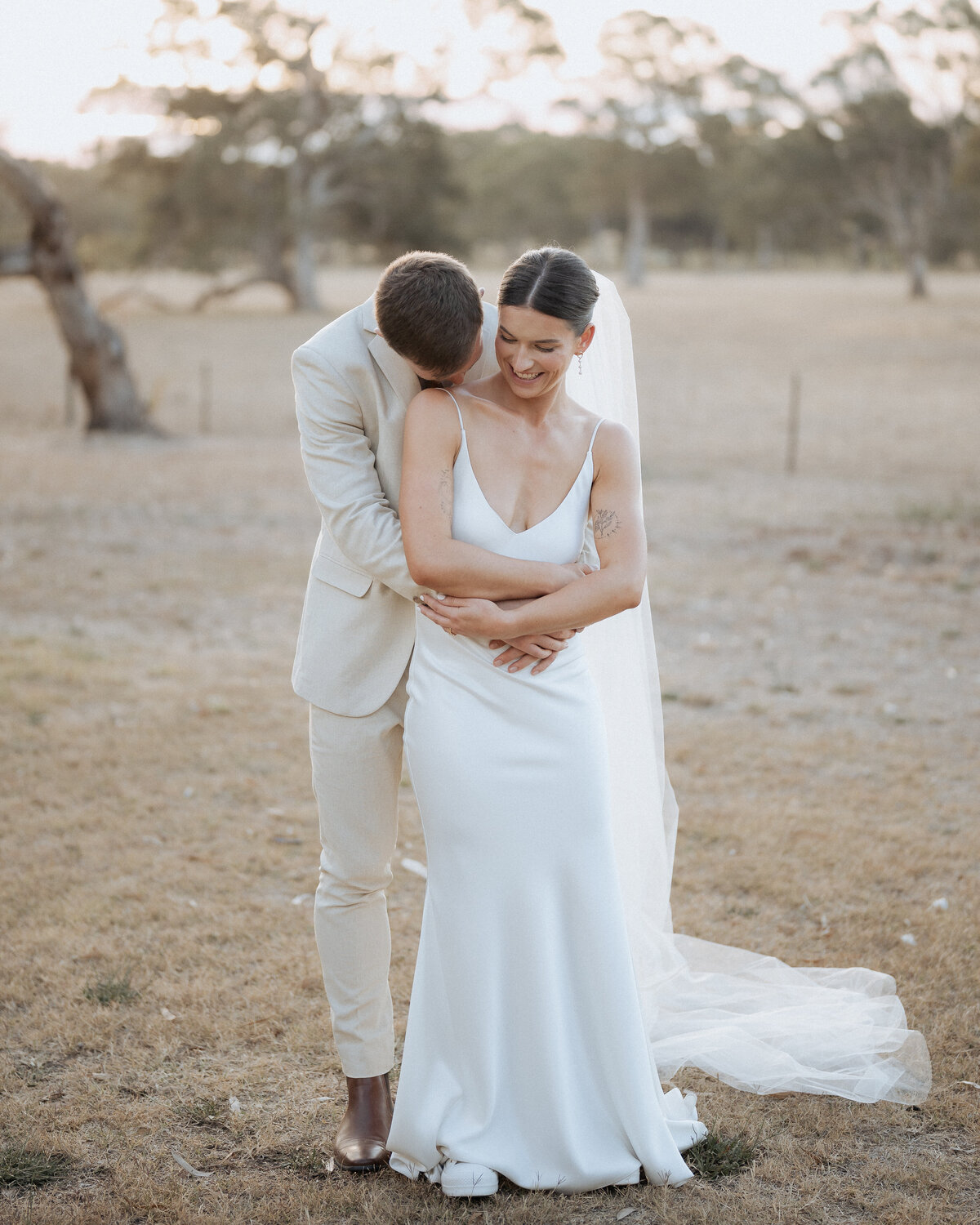 Relaxed and playful wedding portraits of a happy couple in Adelaide, taken by JakeyVass Media.