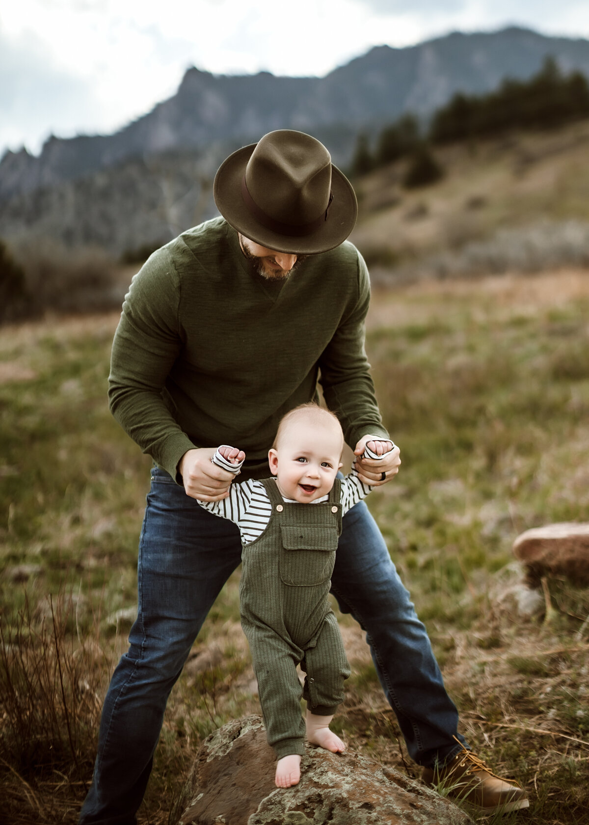 Father and Son play in a field for Family Photos in Boulder Colorado