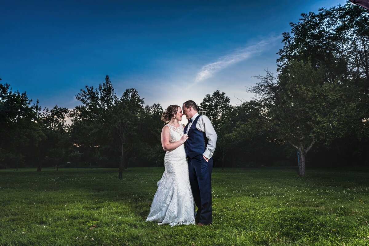 bride and groom embrace at moreland mansion