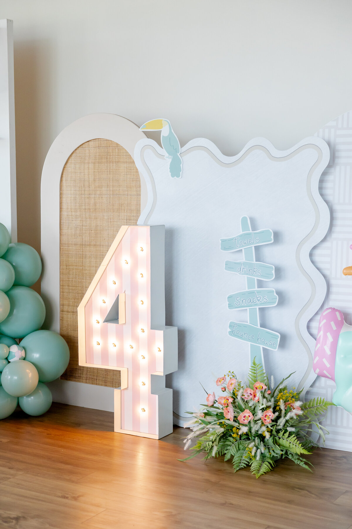 Number 4 with stripes, beach flowers, pool sign, wavy arch and toucan cutout. 