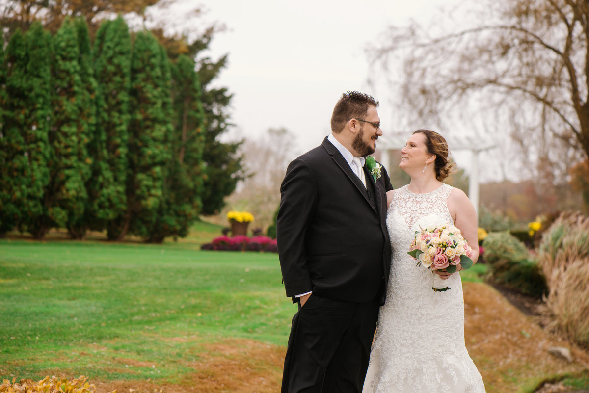 bride and groom on golf course at willow creek golf and country club
