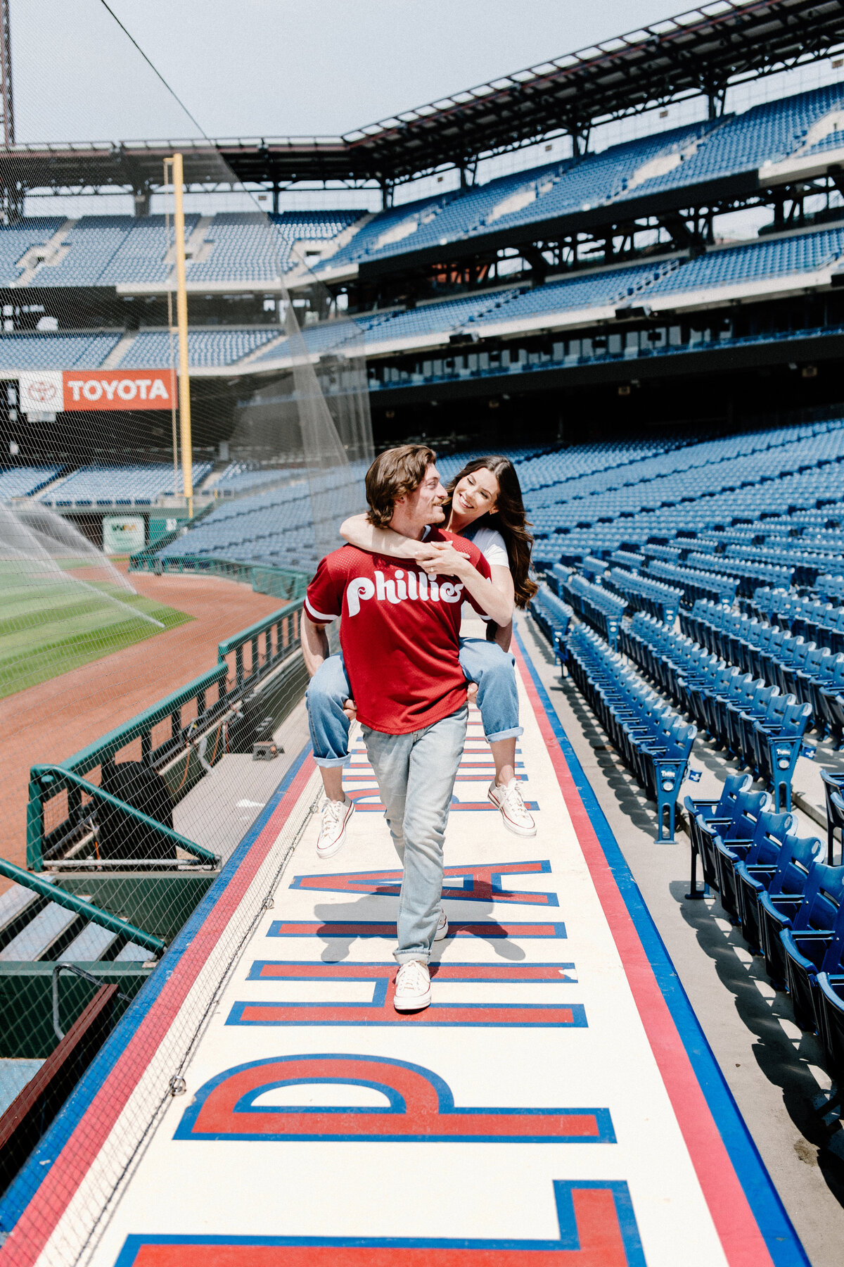 Piggy back ride on top of Philadelphia Phillies dugout at Citizens Bank Park