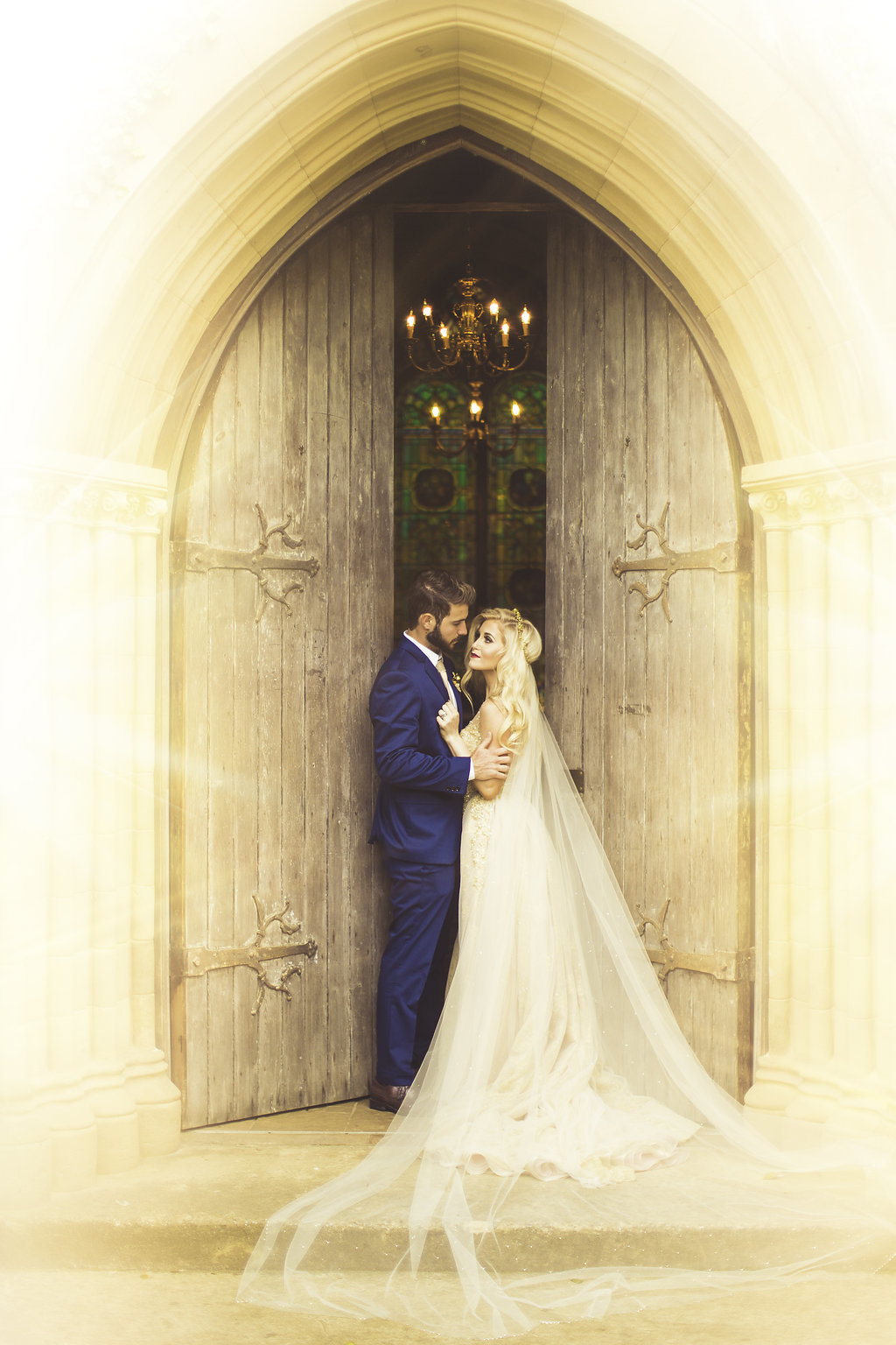Wedding Photograph Of Bride and Groom Standing at the Door of Church Los Angeles