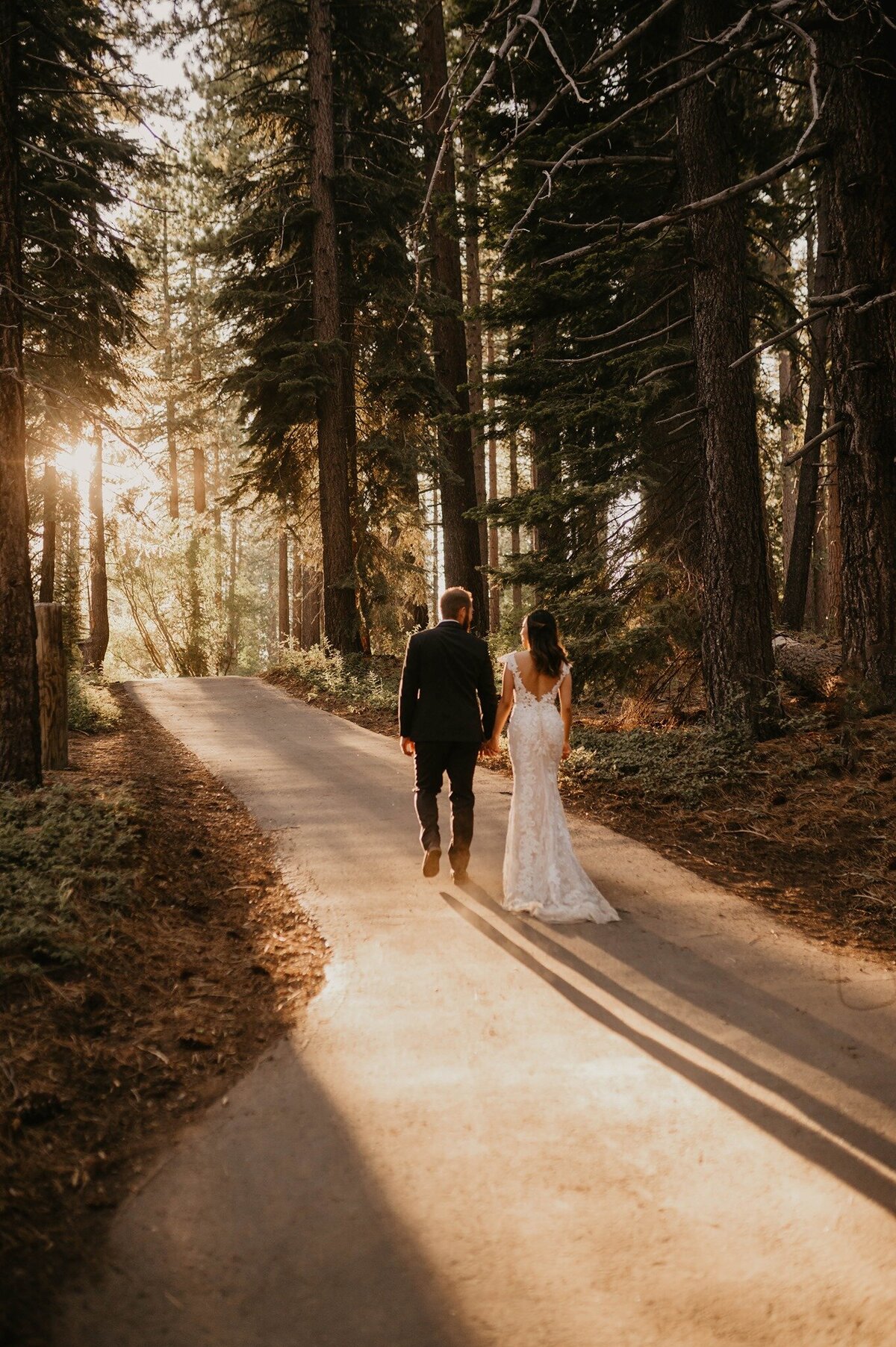 A couple walking into the sunset in Lake Tahoe, California