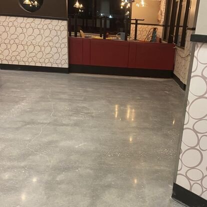 Custom polished concrete for commercial properties, providing high-end, durable, and visually appealing flooring solutions for businesses.