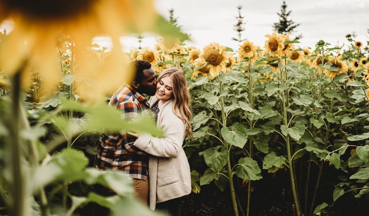 couple hugging at green thumb kids in edmonton