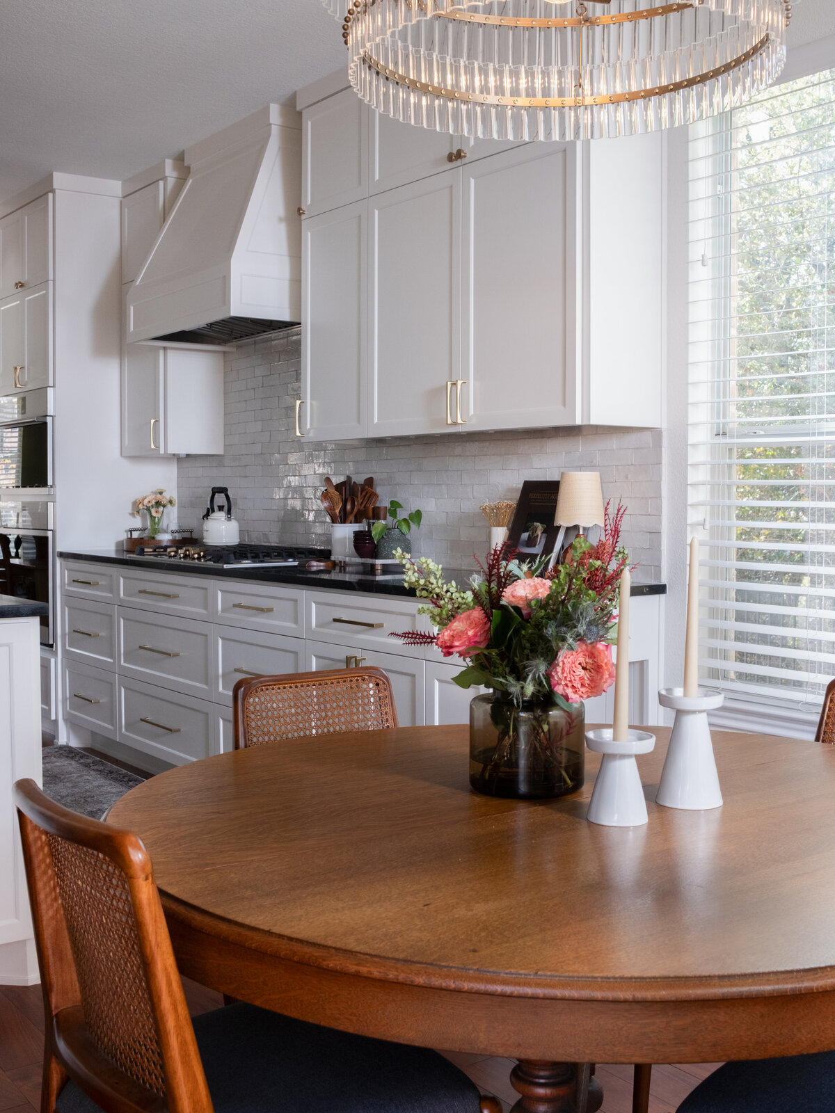 hello-home-austin-cream-kitchen-remodel-zellige-backsplash-contemporary-kitchen-vintage-breakfast-nook-tapered-vent-hood-soapstone-countertop-15