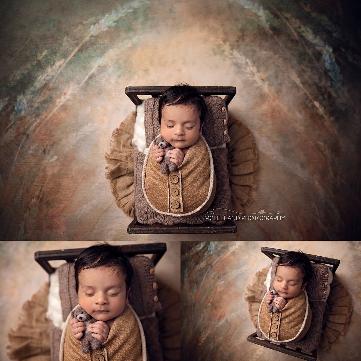Rustic newborn portrait of baby boy in brown wrap on textured earth-toned background.