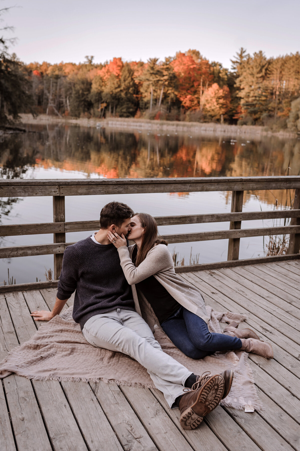 Couple Kissing on a boardwalk