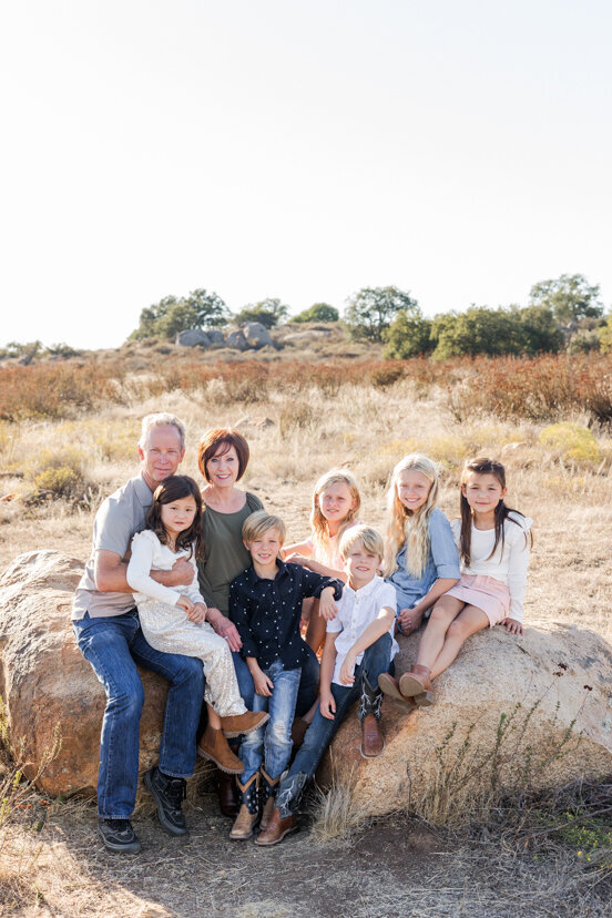 grandparents-and-grandchildren-sitting-on-rock-wrights-field-san-diego