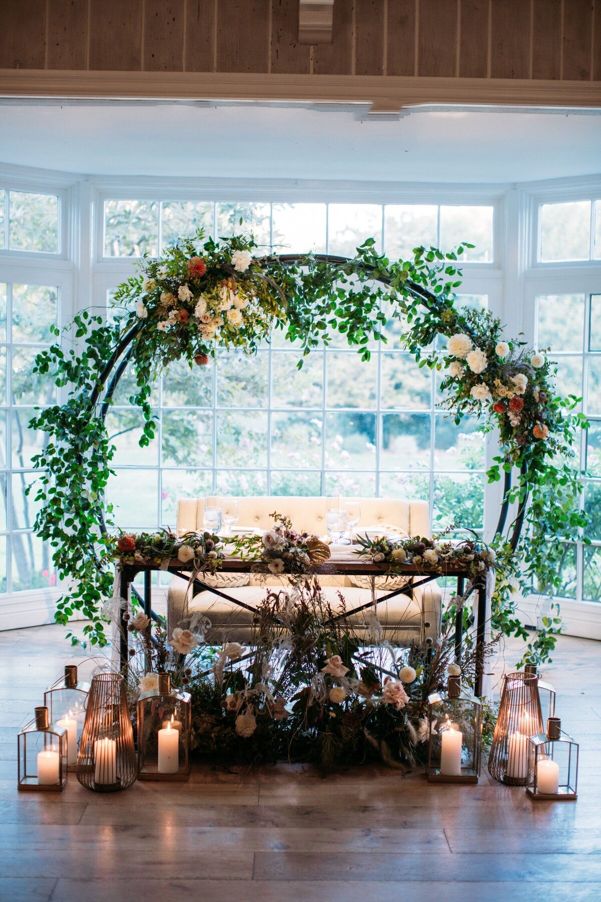 sweetheart table with arch