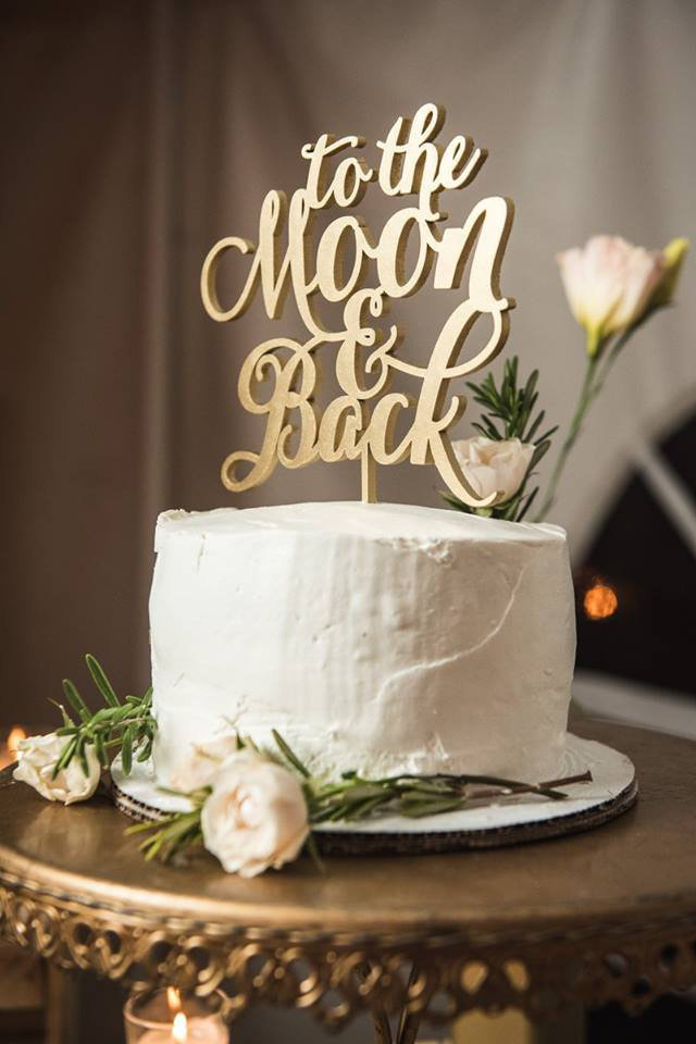 Granby-colorado-strawberry-creek-ranch-hipster-mountain-wedding-to-the-moon-and-back-cake-topper
