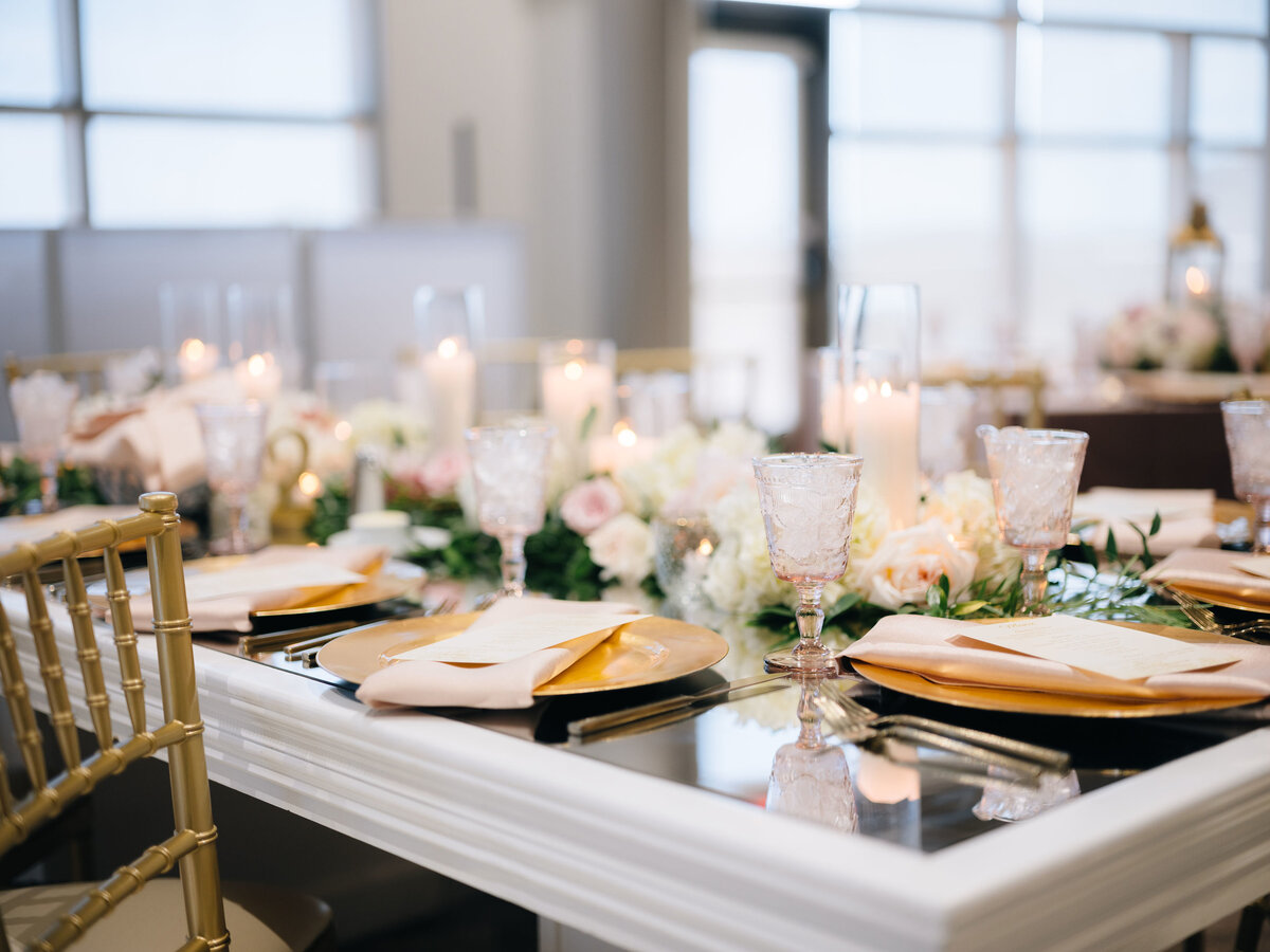 Indoor reception with gold and white