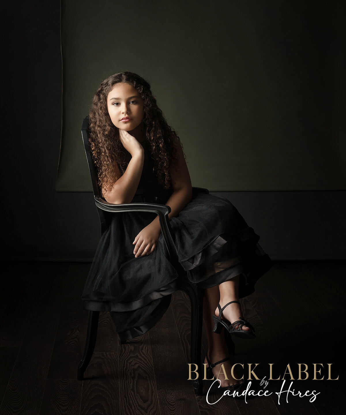 african american girl in a black gown photographed luxury style