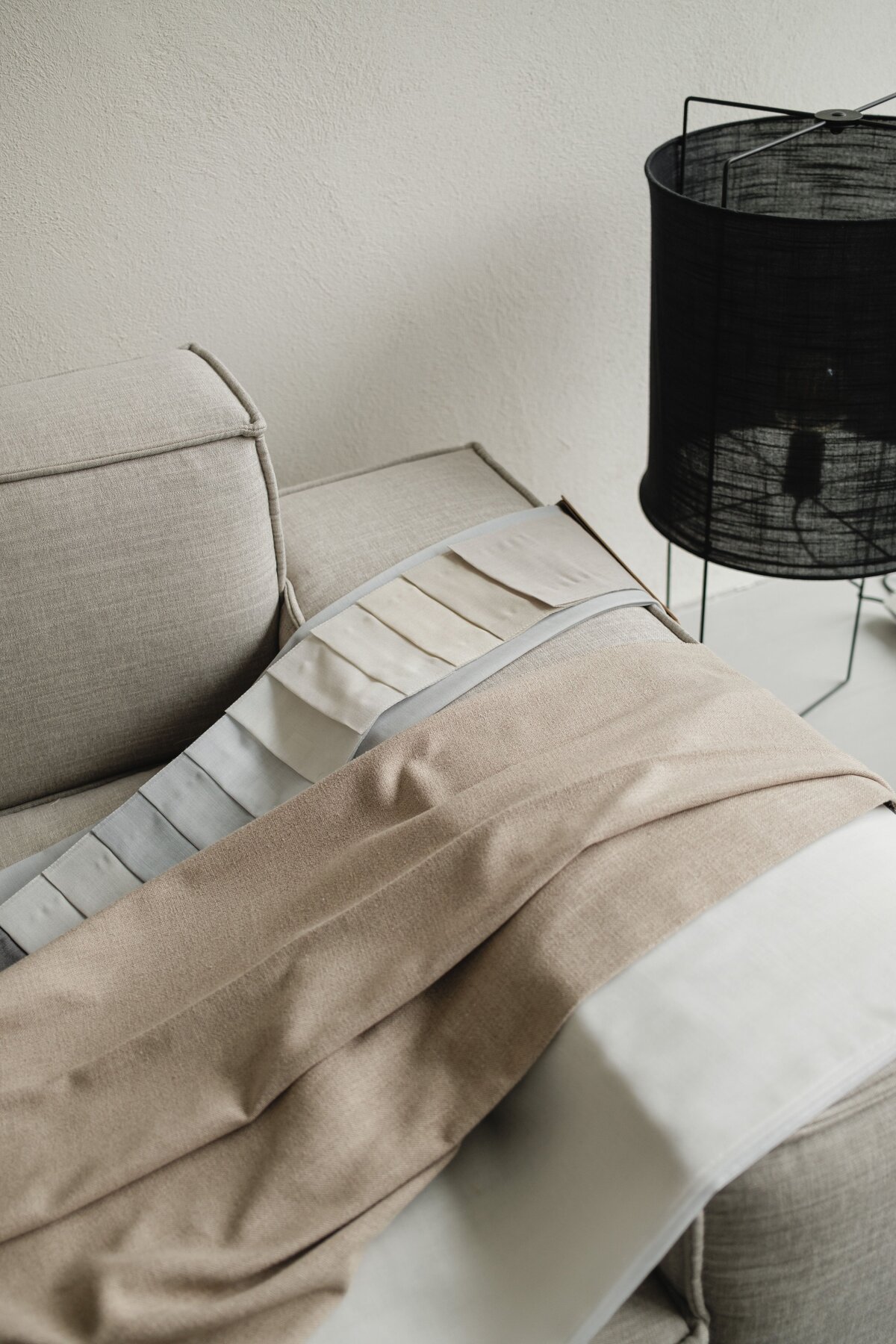 processed_kaboompics_interior-design-material-board-home-styling-a-neutral-color-scheme-fabric-samples-35135