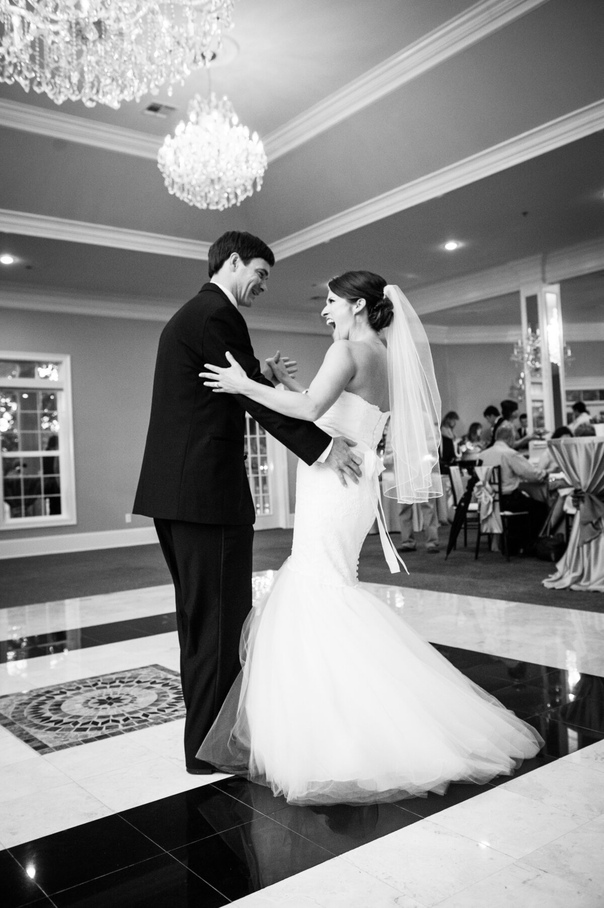 Bride and groom dance at Oak Crest Mansion